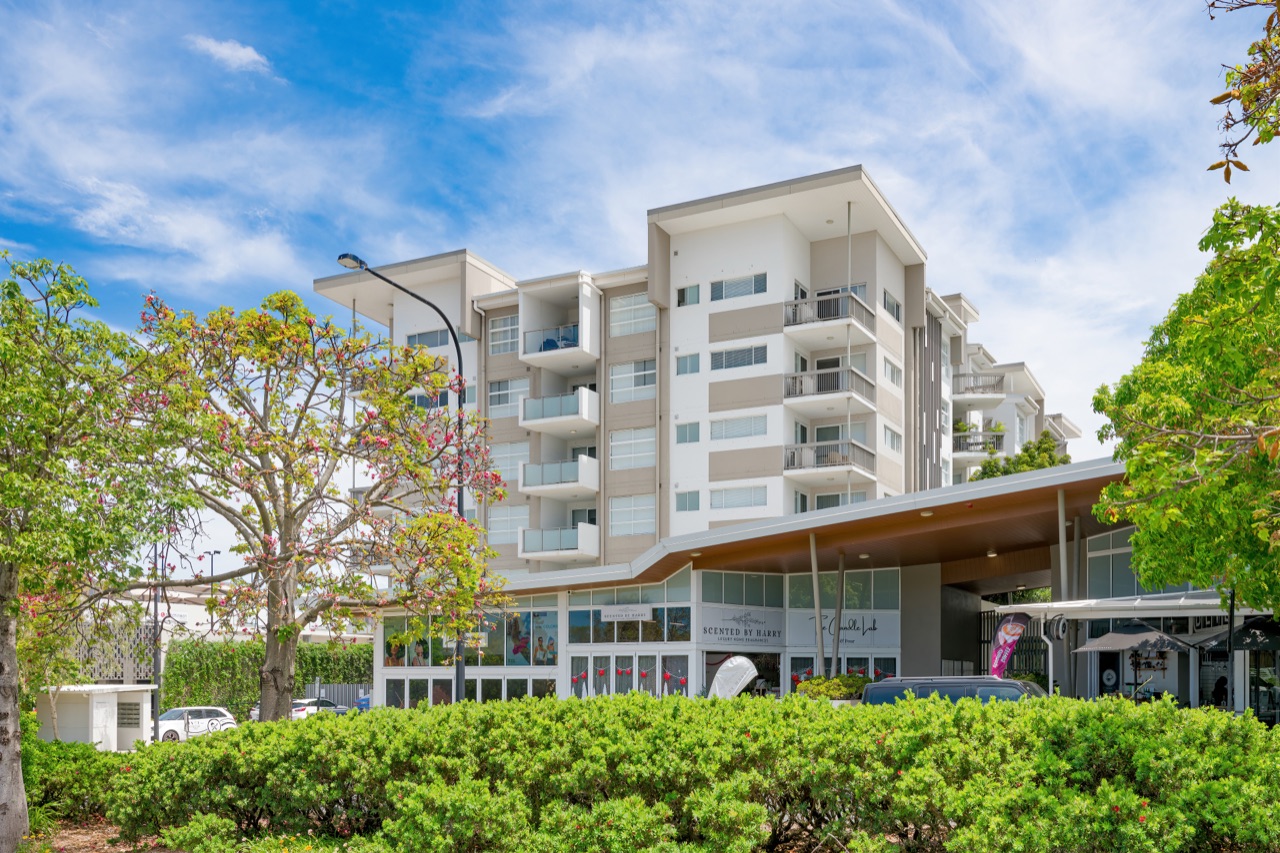 Boulevard North Lakes building from Endeavour Boulevard with frangipani trees