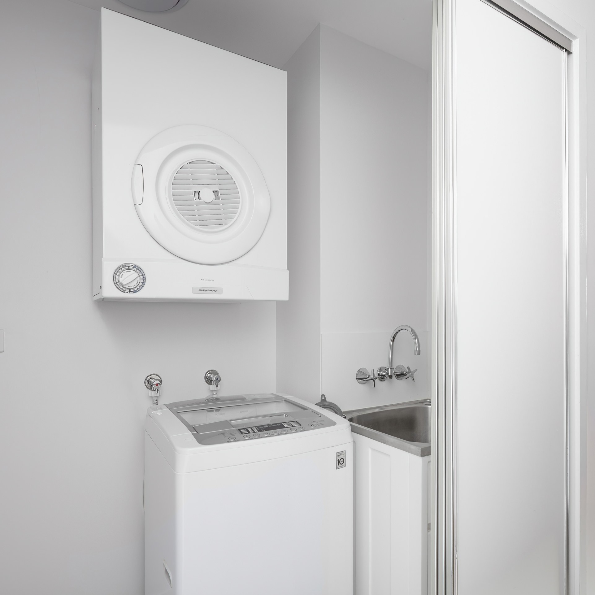 In-apartment laundry with washing machine, dryer and tub